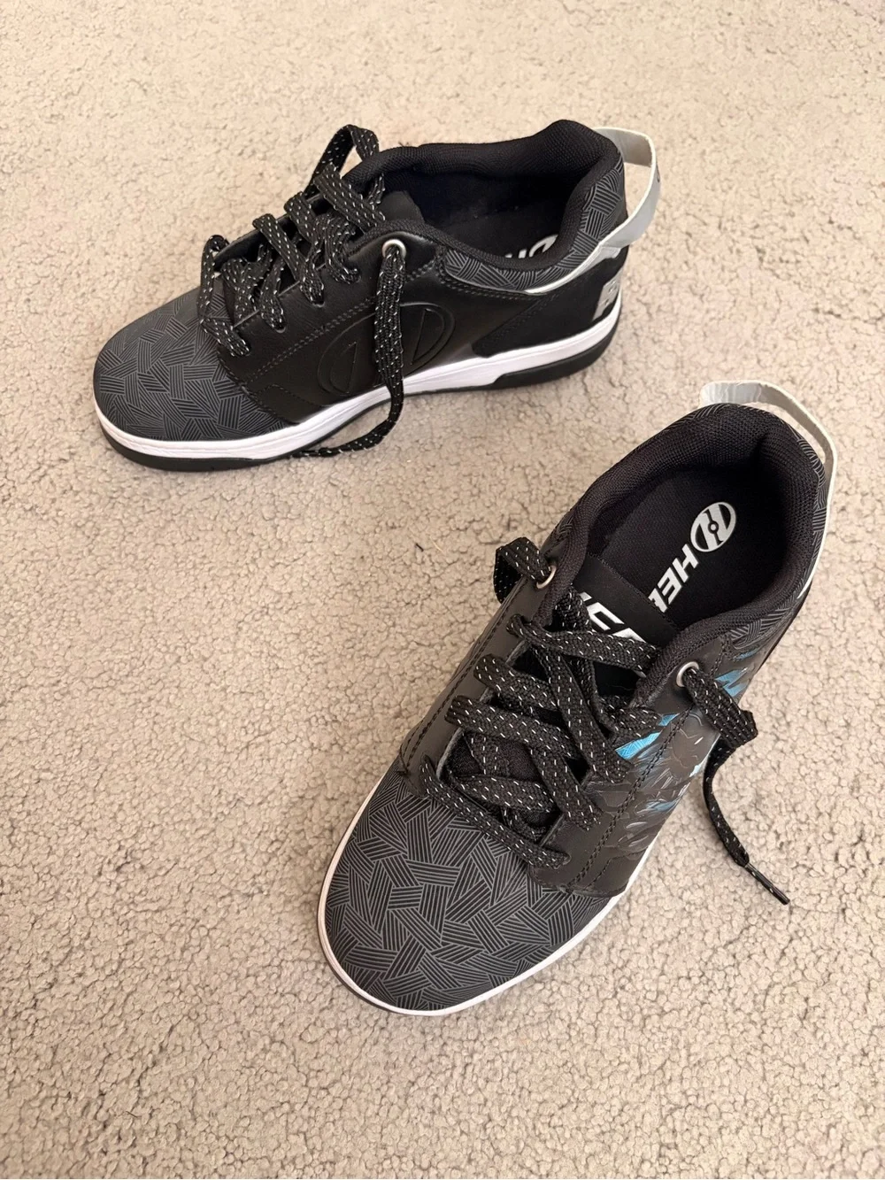 Heelys Black and White Kids' Sneakers with Subtle Blue Accent